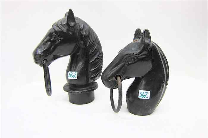 Appraisal: TWO CAST IRON HORSE HEAD HITCHING POST CAPS both painted