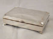 Appraisal: A sterling silver hallmarked jewel box on four feet in