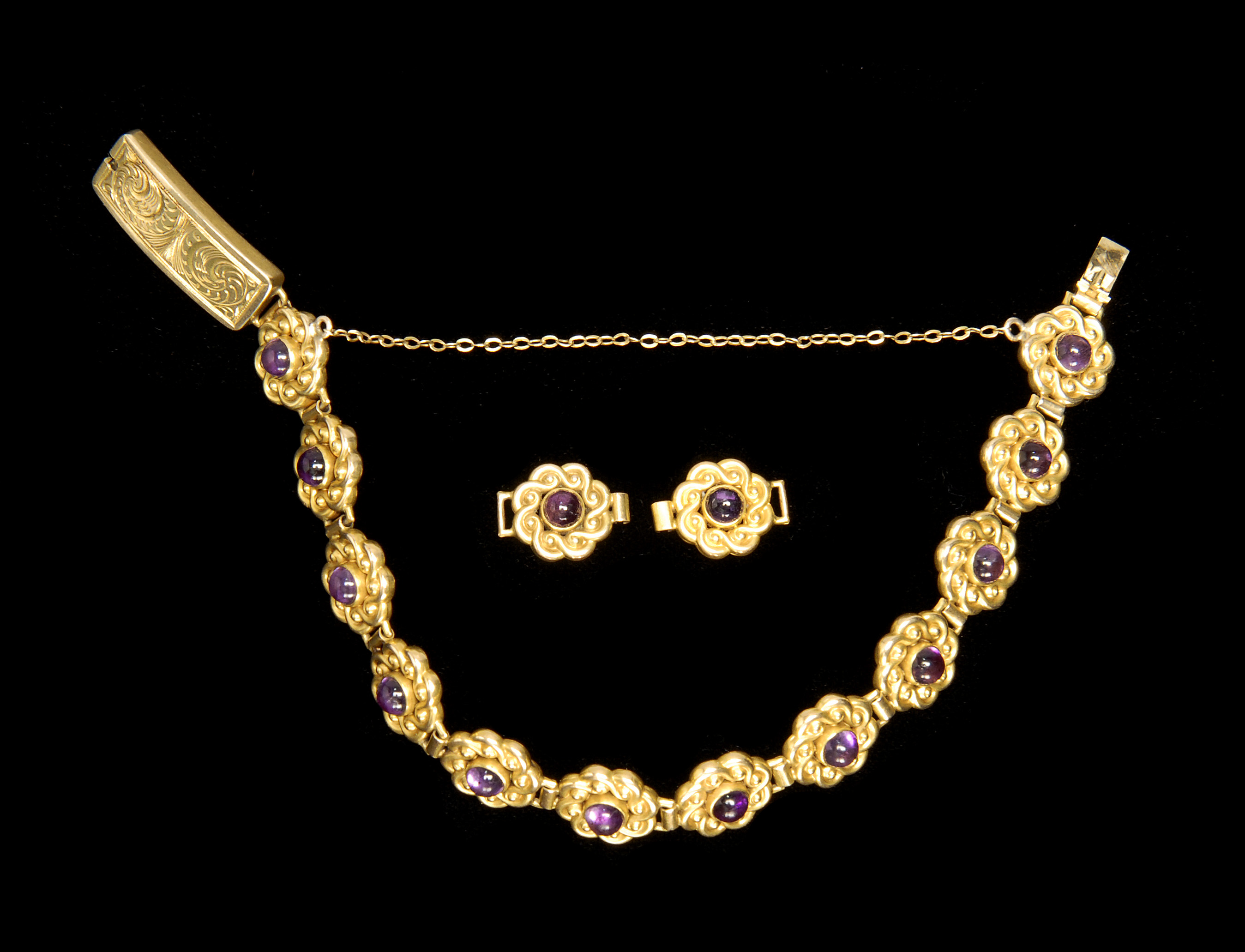 Appraisal: GOLD AND AMETHYST BRACELET First Half th CenturyComposed of twelve