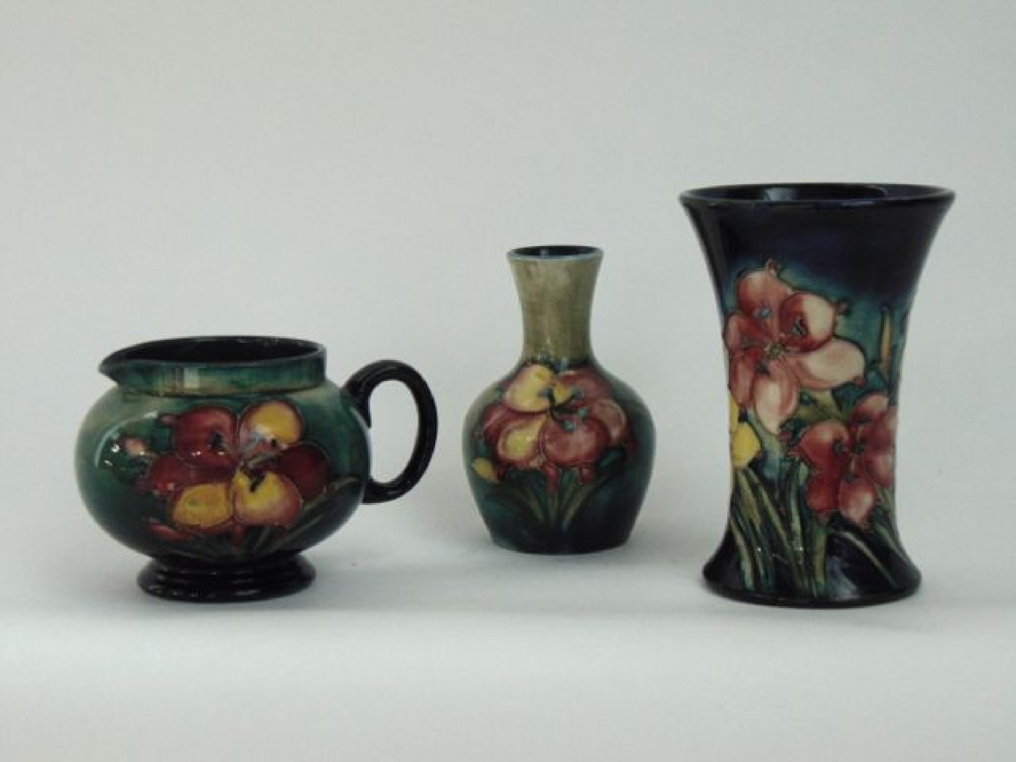 Appraisal: A collection of three pieces of Moorcroft wares with yellow