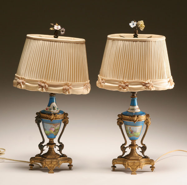 Appraisal: Pair hand painted French porcelain boudoir lamps with ormolu mounts