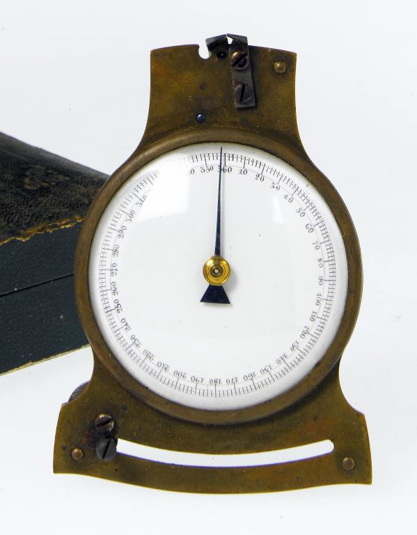 Appraisal: A BRASS MICROMETER the enamelled dial with degree scale and