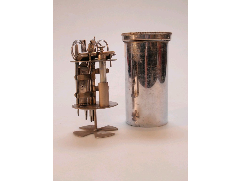 Appraisal: A Surgeons travelling instrument set chrome plated cylindrical case stamped