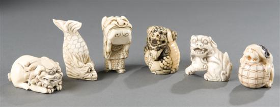 Appraisal: Group of fu dog ivory bone netsukes th century Shishi