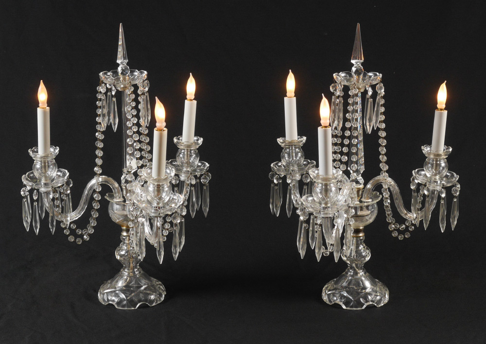 Appraisal: PAIR CRYSTAL ARM TABLE TORCHIERS Electric crystal and chrome cut