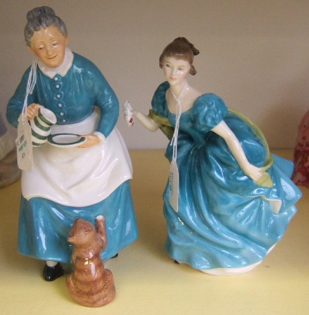 Appraisal: Two Royal Doulton figures 'Rapsody' H N and 'The Favourite'