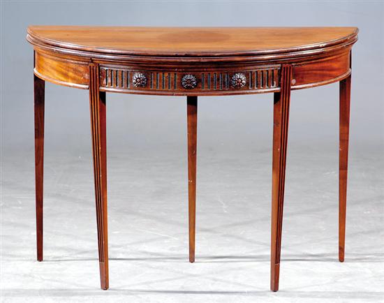 Appraisal: Adam style mahogany card table circa folding demilune top supported