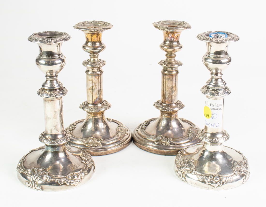 Appraisal: TWO PAIRS OF SHEFFIELD PLATED CANDLESTICKS Two pairs of Sheffield