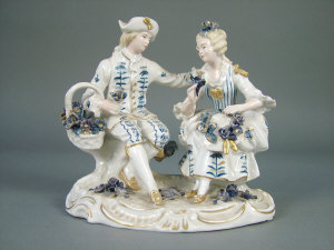 Appraisal: A Sitzendorf porcelain figural group of a young man and