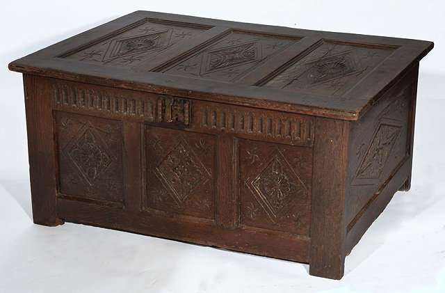 Appraisal: AN TH CENTURY SMALL OAK COFFER with carved panel front