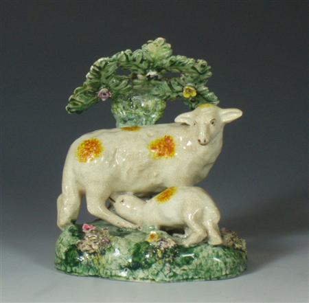 Appraisal: An early th century Staffordshire figure group of a sheep