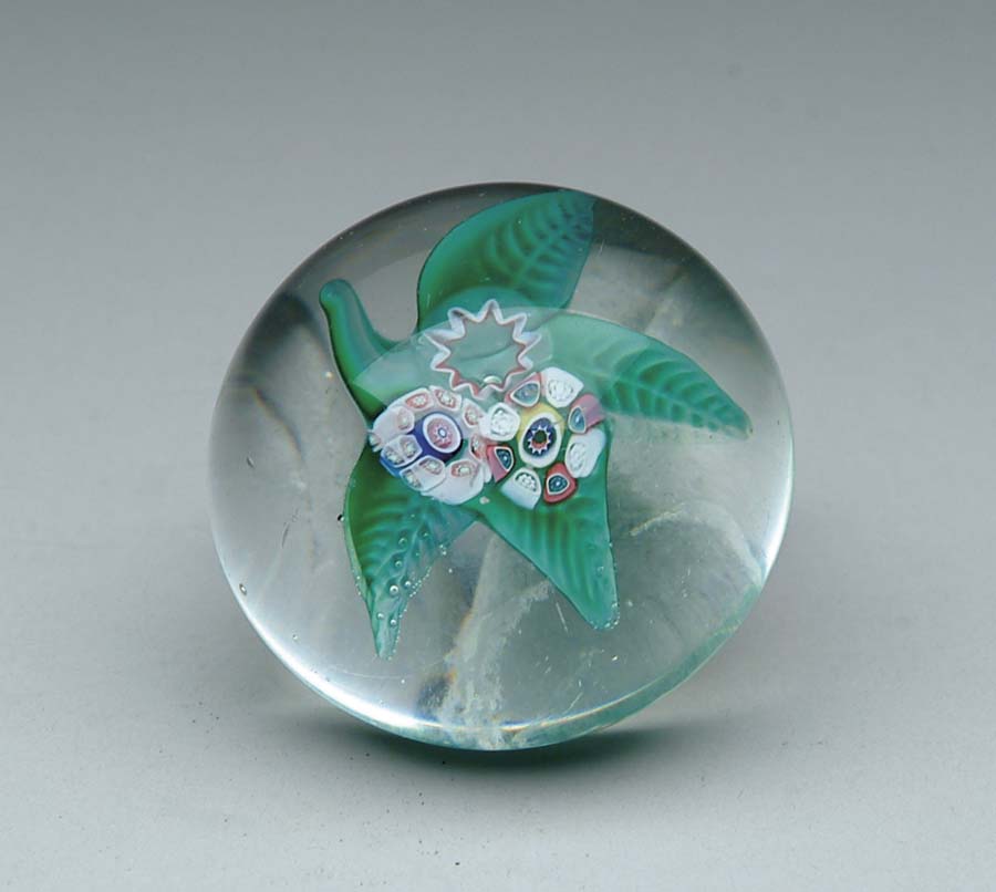 Appraisal: NEW ENGLAND NOSEGAY PAPERWEIGHT Antique millifiori style paperweight features nosegays