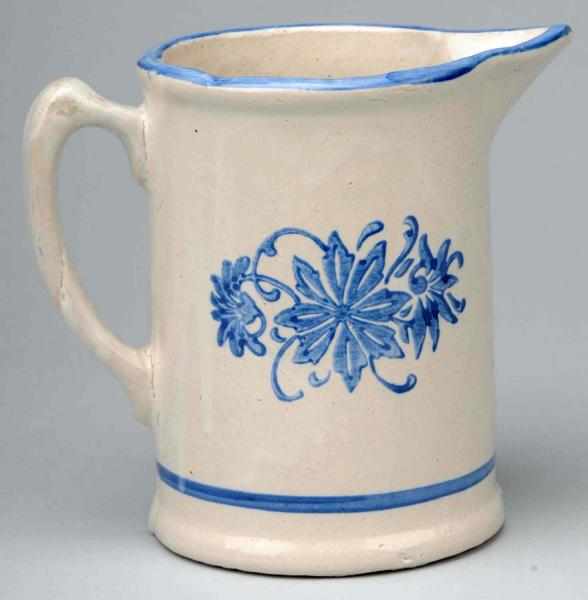 Appraisal: Blue Stenciled Decorated Stoneware Pitcher Description Circa s No damage