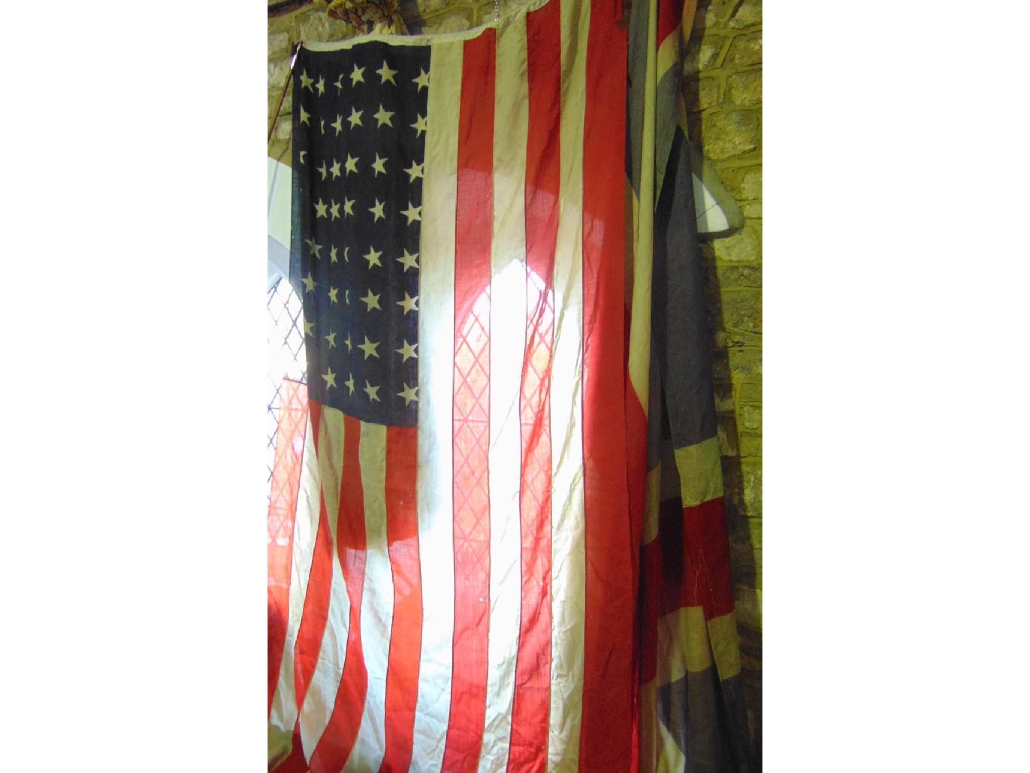 Appraisal: A large antique American flag together with a large antique