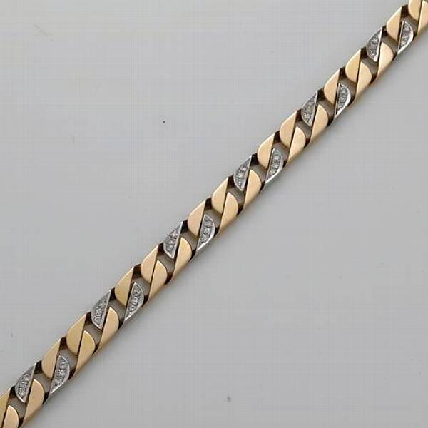 Appraisal: A diamond and k bicolor gold link necklace weighing approximately