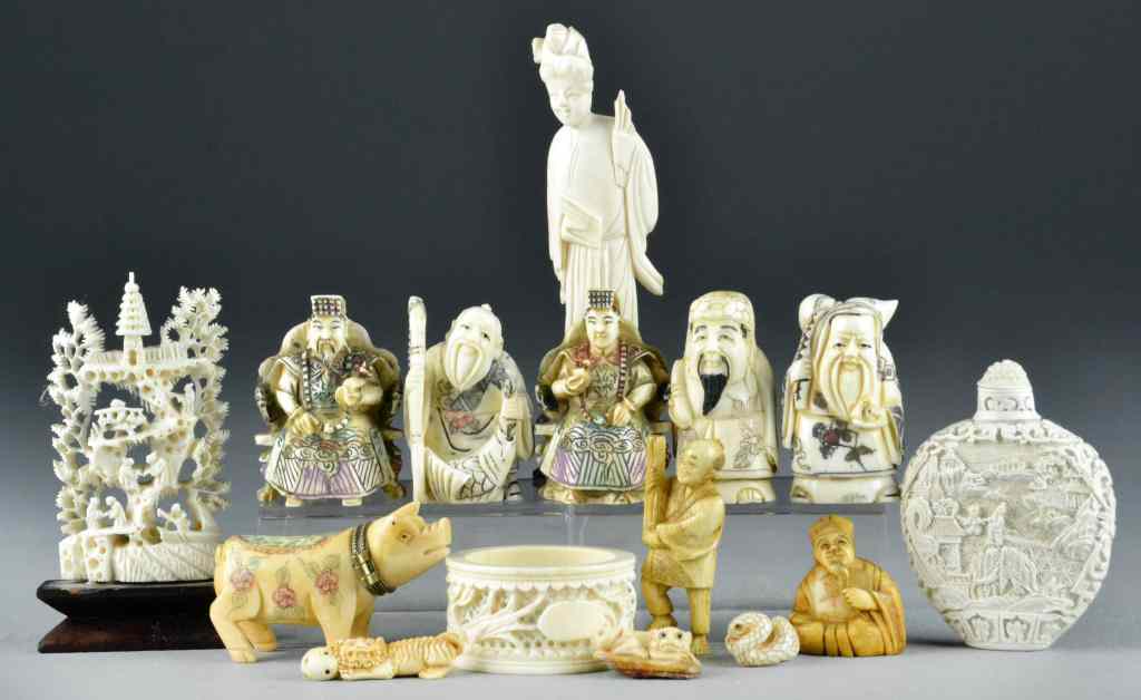 Appraisal: Chinese Japanese Ivory Bone ComposistioTo include two ivory carvings depicting