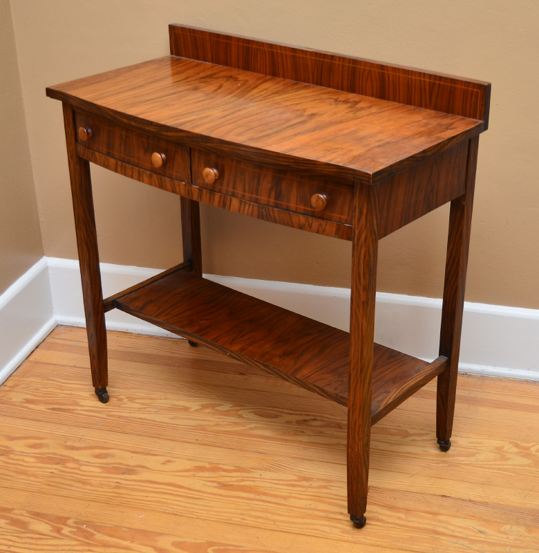 Appraisal: GEORGIAN FRENCH WALNUT SIDE TABLE Highly figured French walnut backsplash