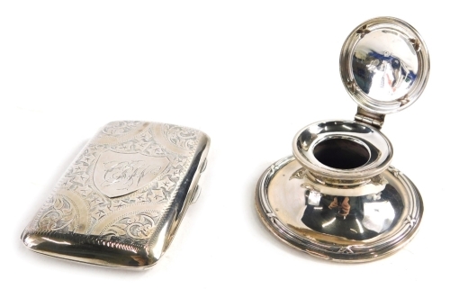 Appraisal: A George V silver cigarette case with curved engine turned