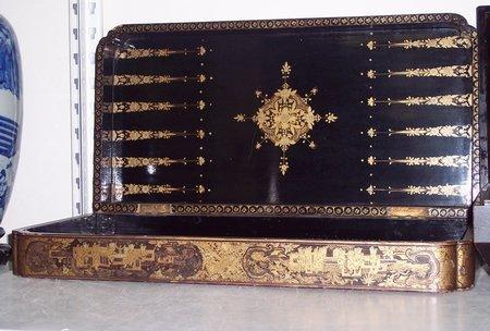 Appraisal: A Japanese lacquered folding chess board the black squares decorated