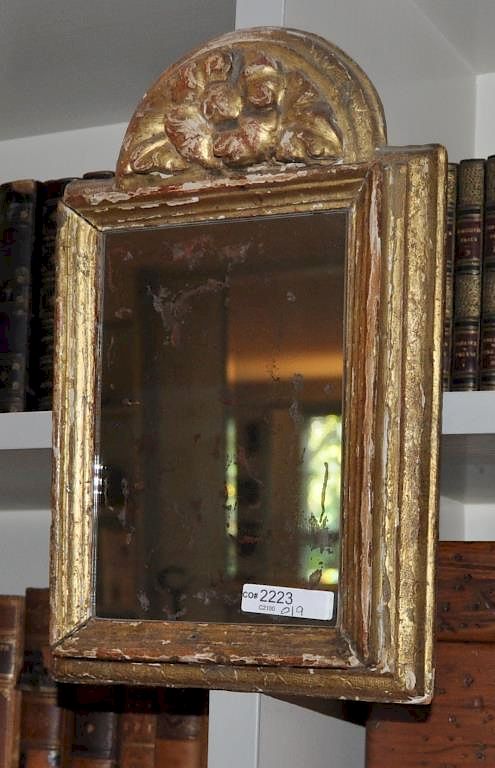 Appraisal: Continental Small Carved Gilded Mirror with arched top losses to