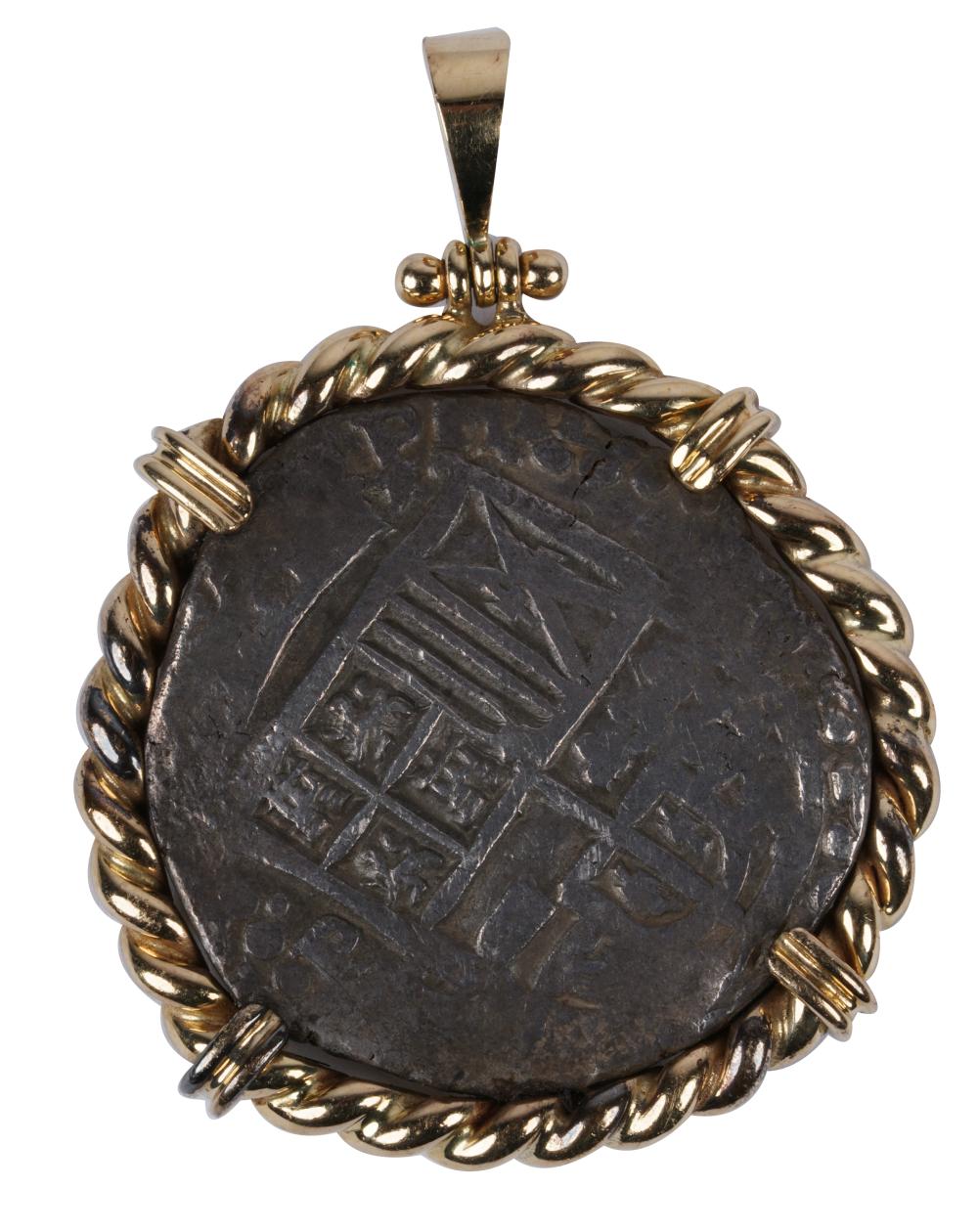 Appraisal: KARAT YELLOW GOLD COIN PENDANTcentering one ancient-style metal coin mounted