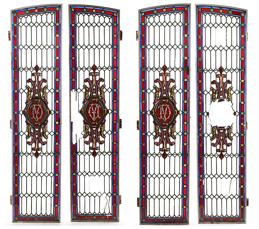 Appraisal: CONTINENTAL STAINED GLASS PANELS IRON FRAMES A lot of four