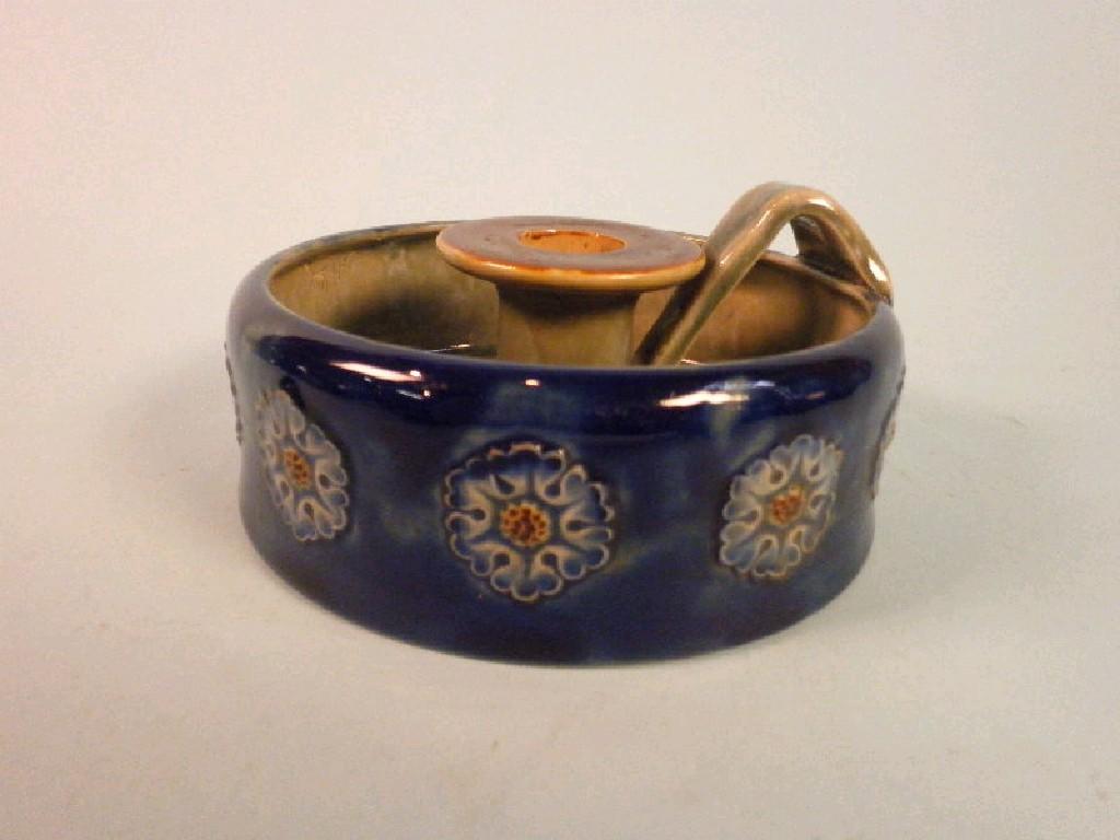 Appraisal: A Royal Doulton stoneware chamber stick decorated with roundels on