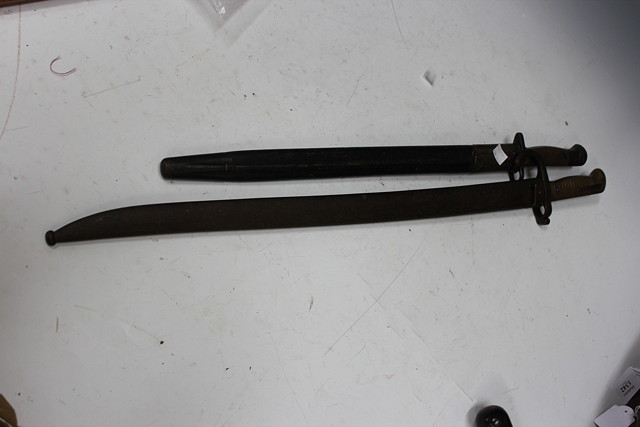 Appraisal: AN EARLY TH CENTURY WILKINSON BAYONET in leather scabbard long