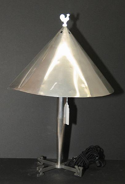 Appraisal: An Art Deco style polished aluminum weathervane table lamp and