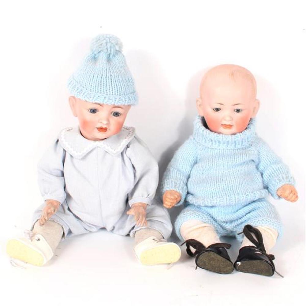 Appraisal: TWO GERMAN BISQUE CHARACTER BABY DOLLS WITH RESTORED DOME SOCKET