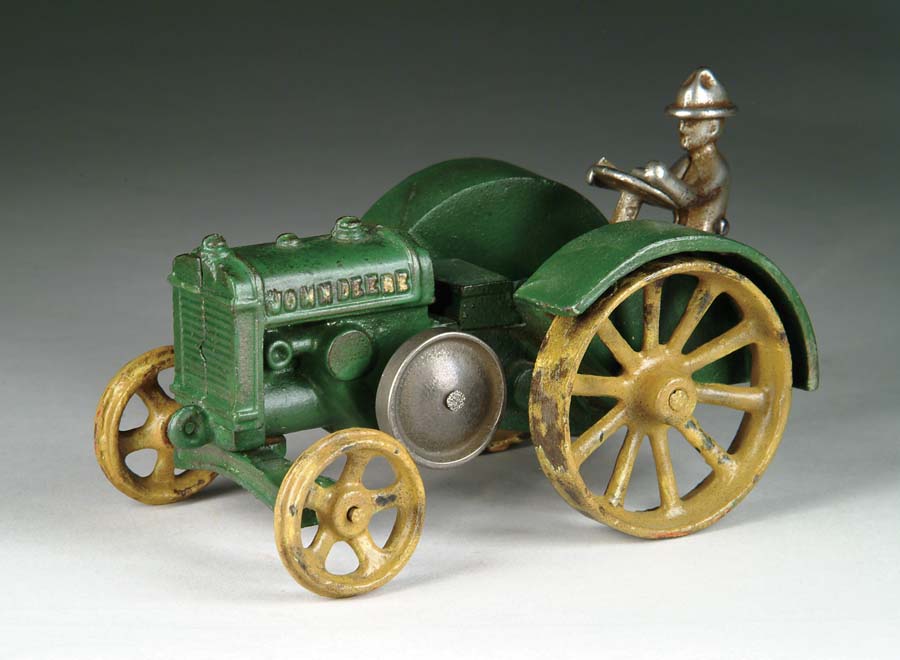 Appraisal: JOHN DEERE TRACTOR Manufactured by Vindex Toys Green tractor embossed