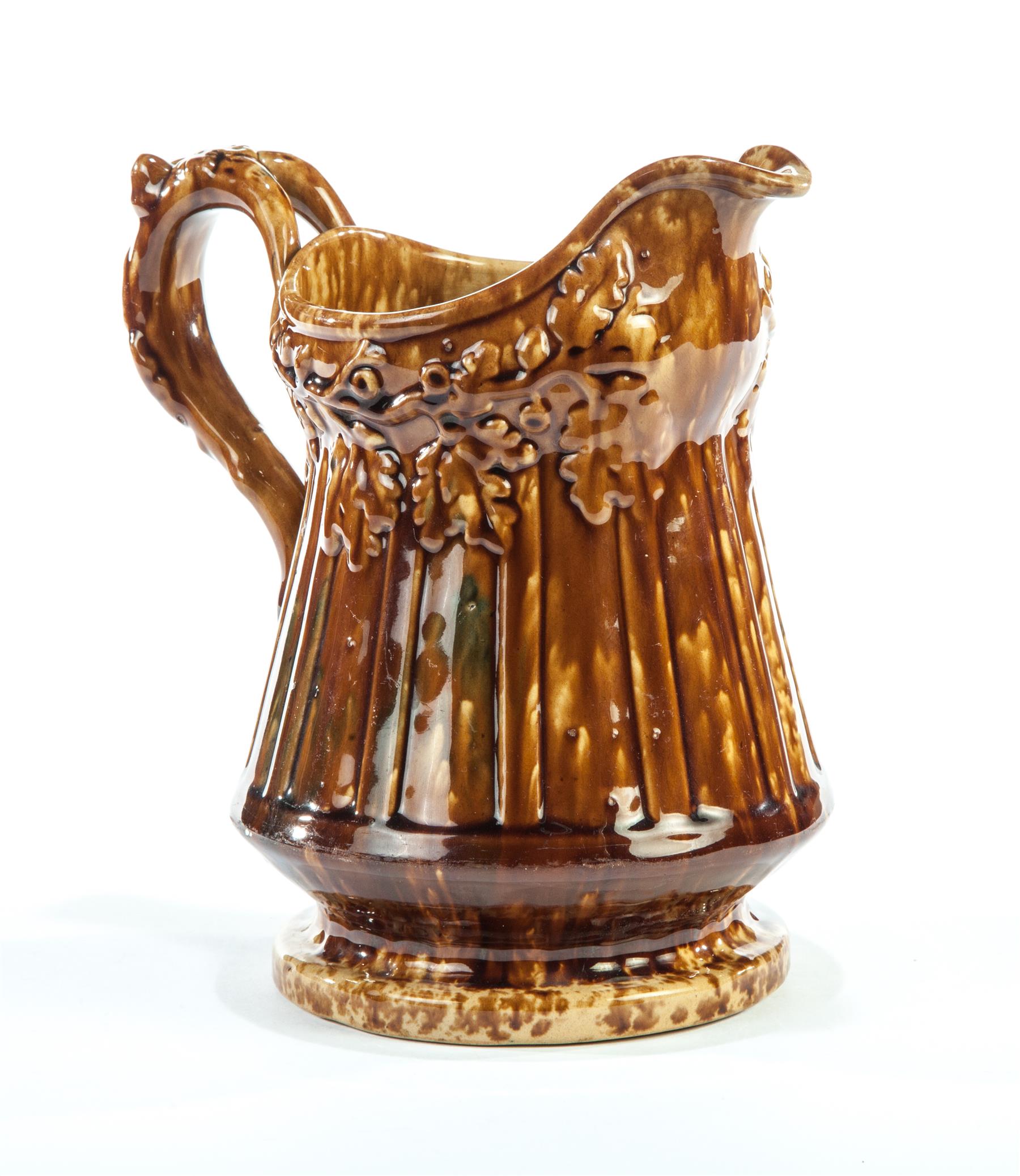 Appraisal: OHIO PANELED PITCHER IN ACORN AND OAK LEAF PATTERN East