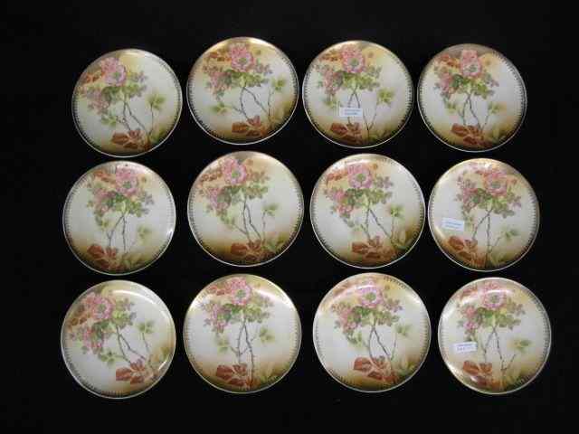 Appraisal: Set of Porcelain Dessert Plates roses with gold trim ''