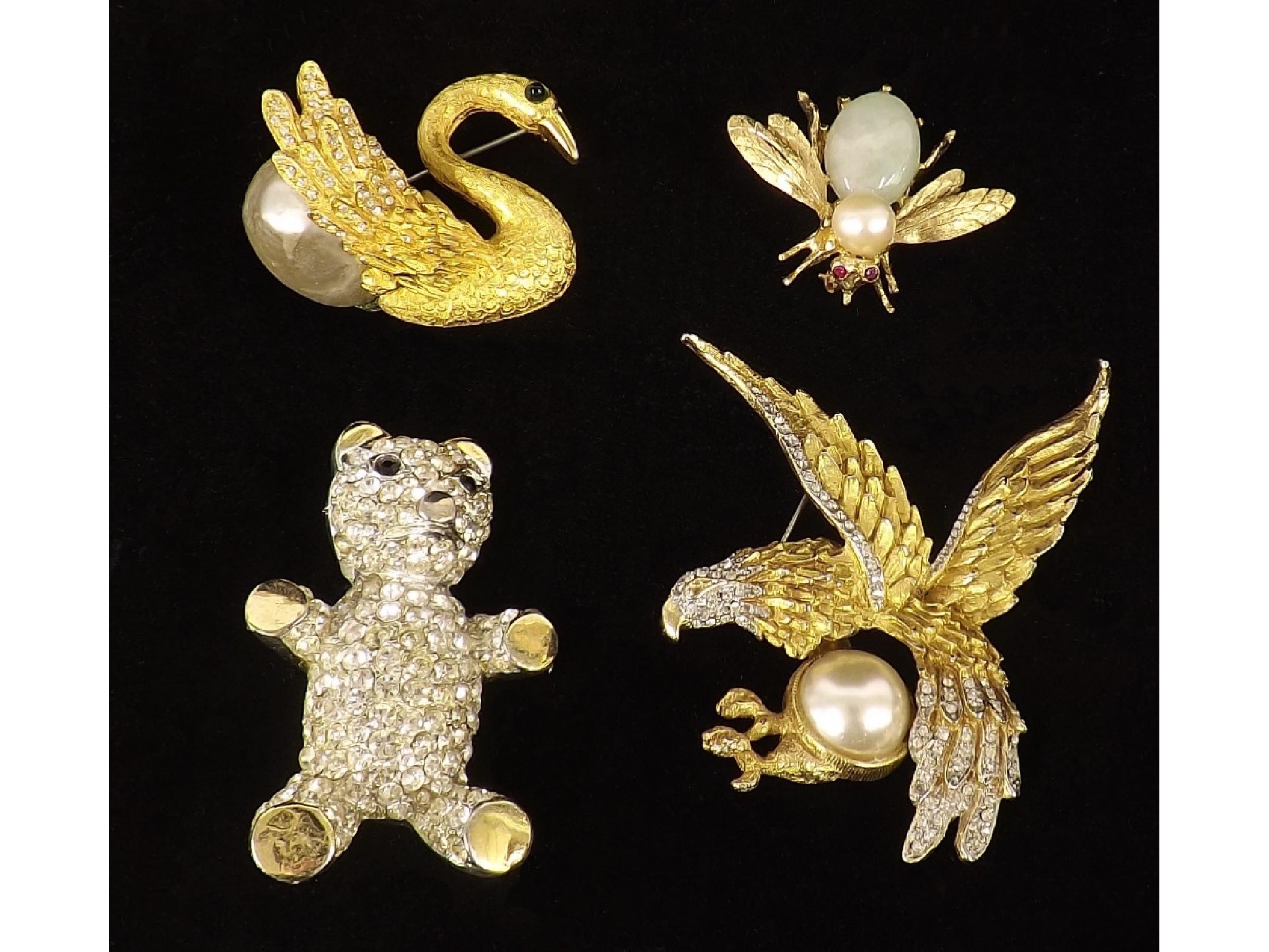 Appraisal: Four various novelty costume brooches the bear signed Lip the