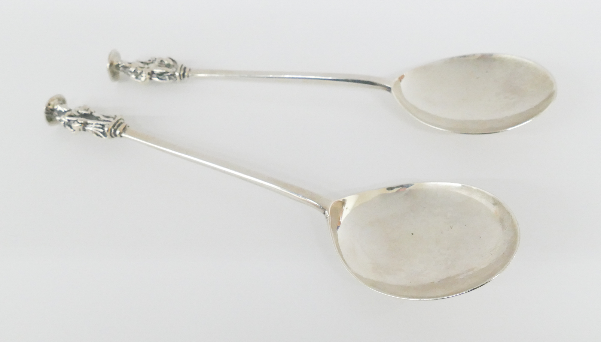 Appraisal: Pair George II James Williams Sterling Seal Top Spoons circa