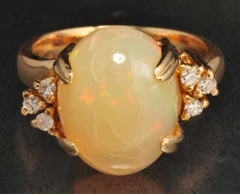 Appraisal: K Y Gold Diamond Opal Ring Description Diamonds ctw Opal