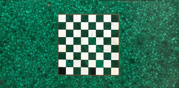 Appraisal: A malachite veneered table top centered by a chequer board