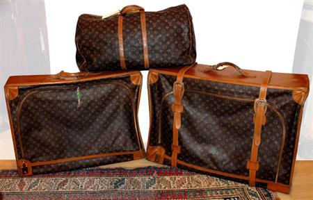 Appraisal: Three Louis Vuitton Suitcases Estimate -