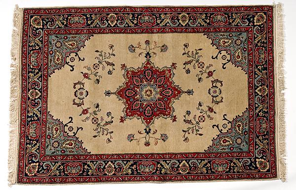 Appraisal: ISFAHAN RUG Iranian th century cream ground with center medallion