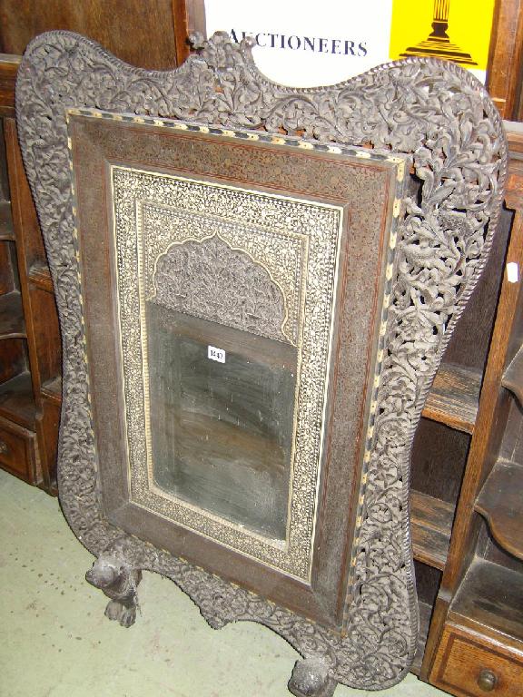 Appraisal: A th century middle eastern hard wood over mantle incorporating