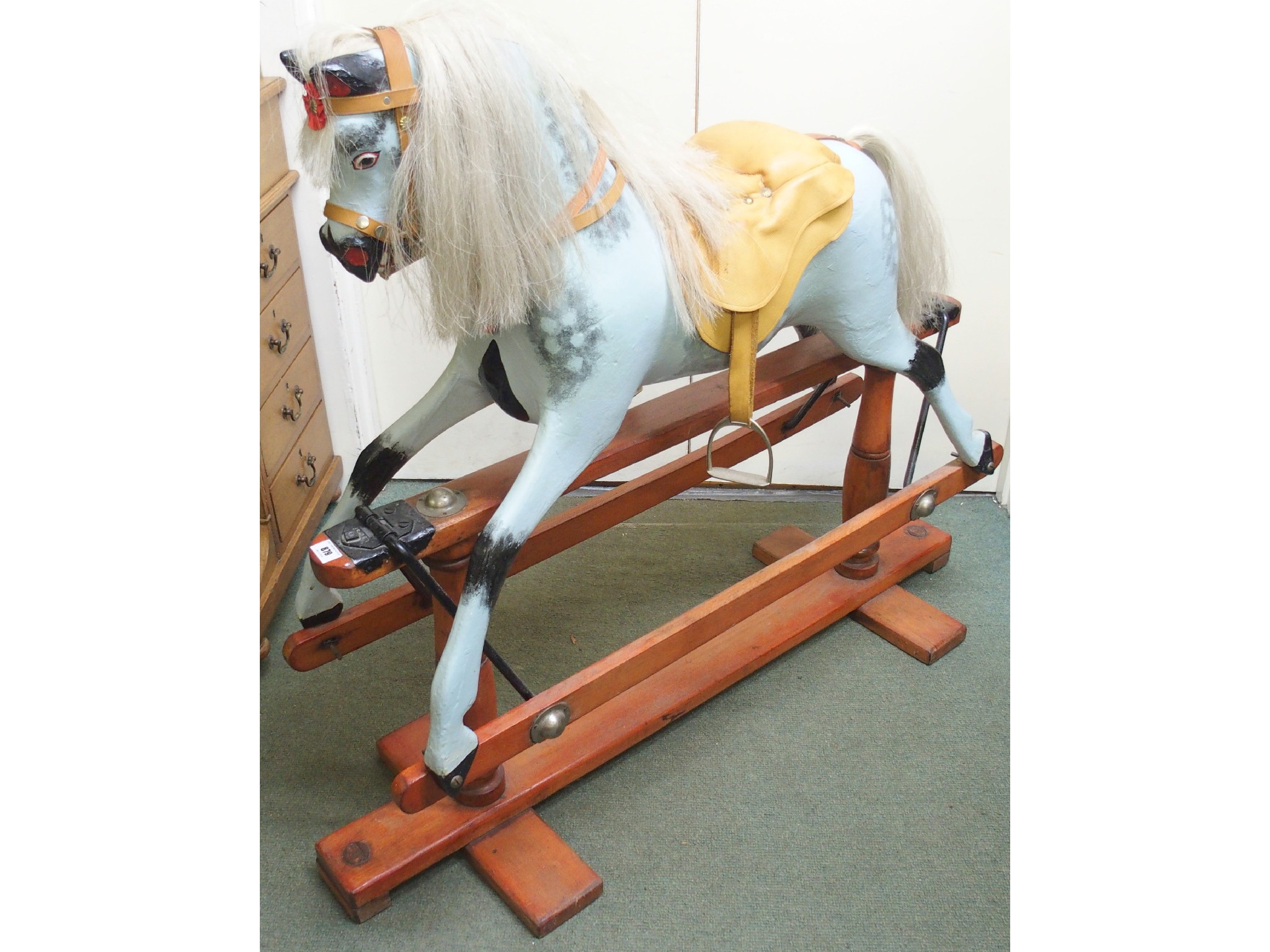 Appraisal: A th Century rocking horse by Links Brothers