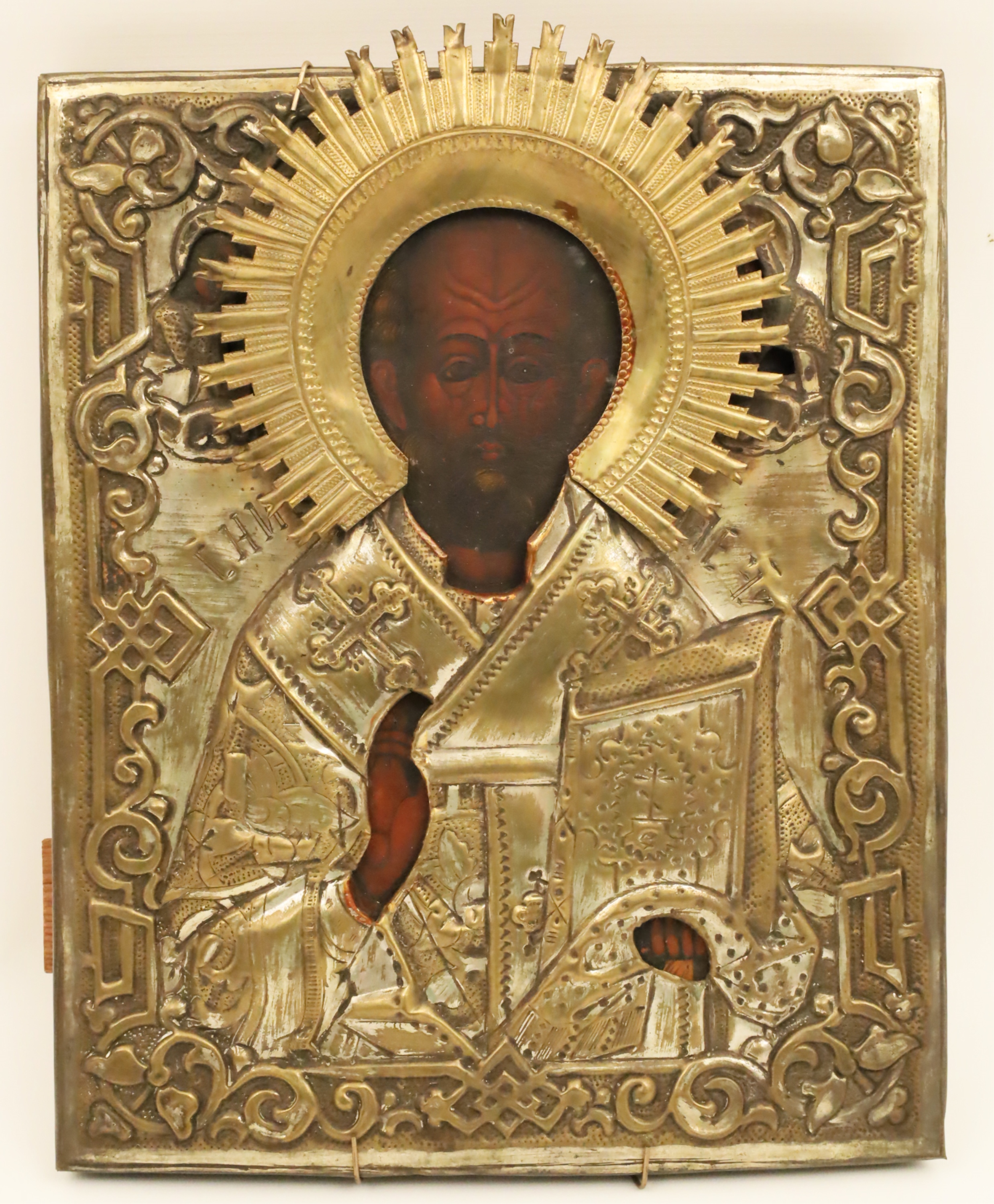 Appraisal: RUSSIAN ICON ST NICHOLAS An early th century heavily emossed