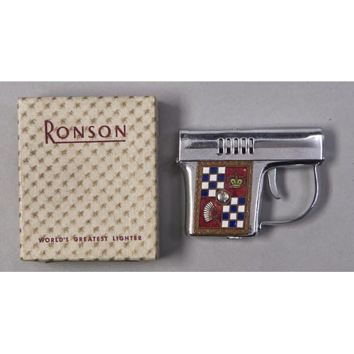 Appraisal: A Ronson Cadet pistol novelty lighter C with maker's guarantee