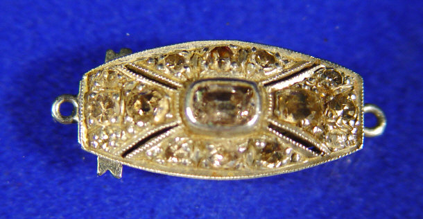 Appraisal: Edwardian white gold clasp set with approximately carat of diamonds