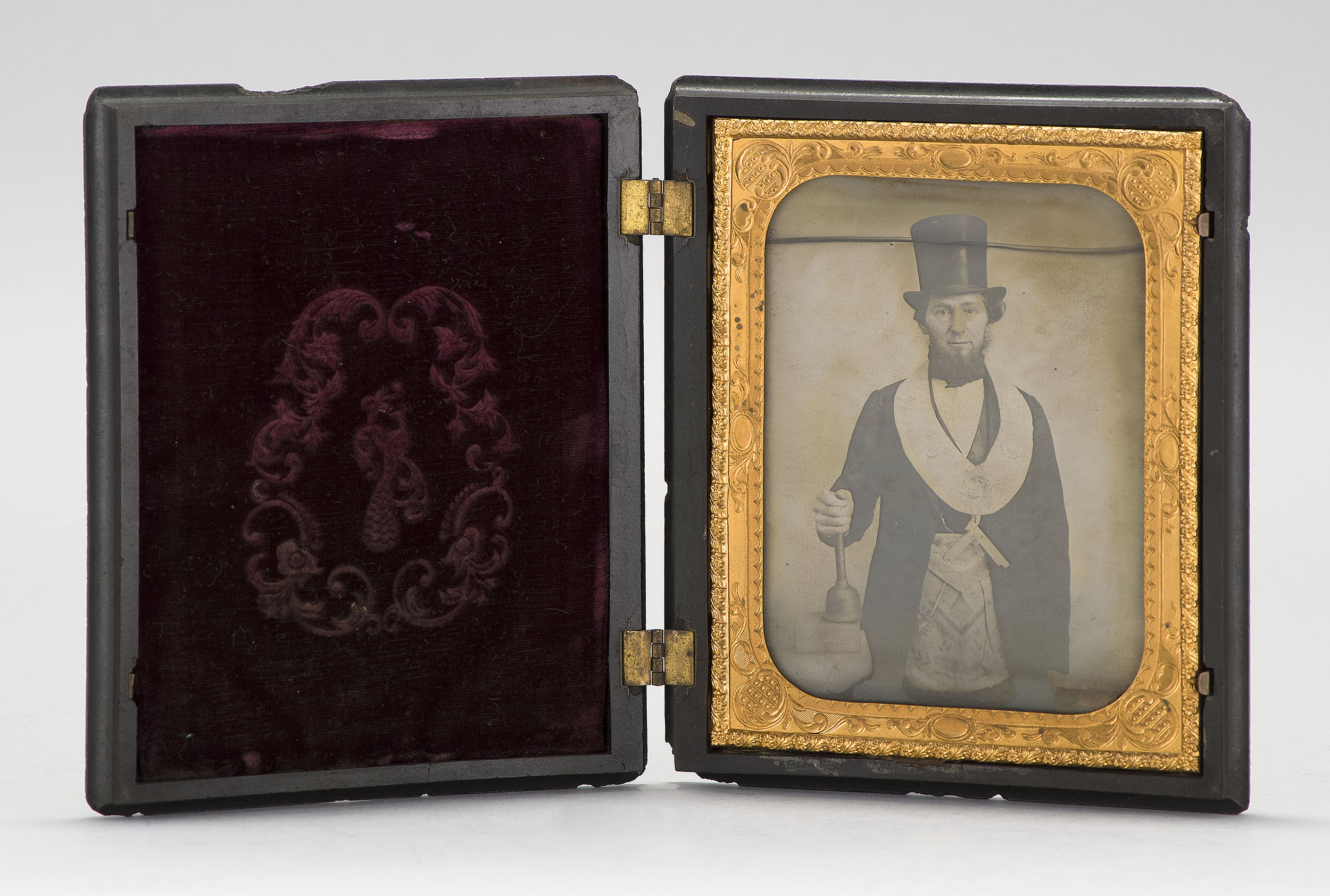 Appraisal: CASED AMBROTYPE th CenturyDepicts a Mason wearing a top hat