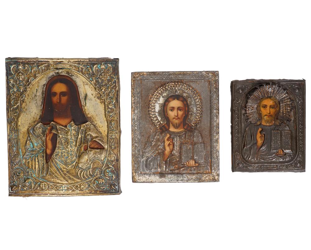 Appraisal: RUSSIAN ICONS WITH SILVER TONE REPOUSSE OKLADSGroup of Russian icons