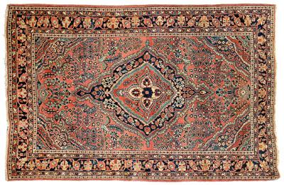 Appraisal: Sarouk rug heavy construction typical central medallion on salmon field