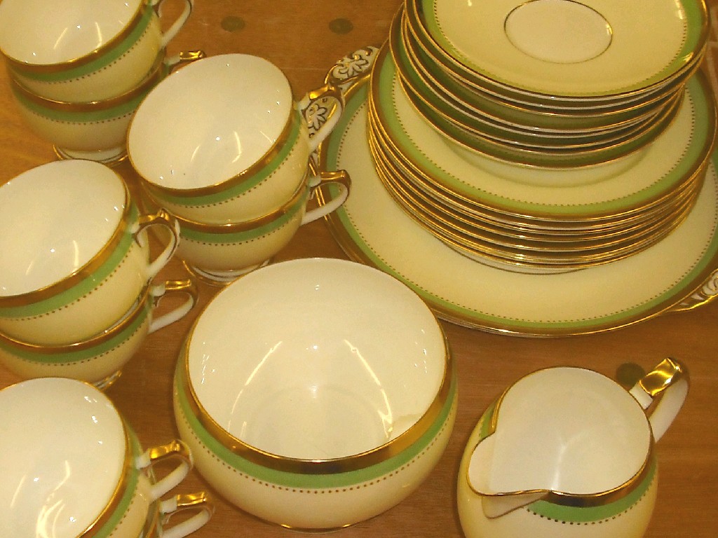 Appraisal: Shelley tea service decorated with green and gilt bands on