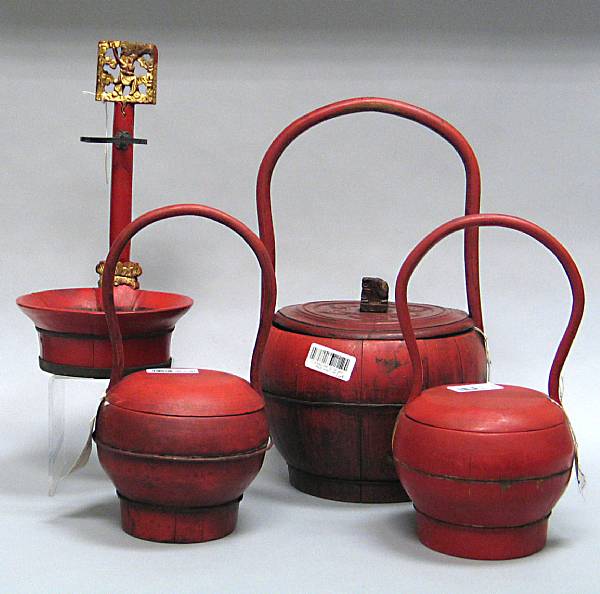 Appraisal: A group of eight red lacquer-painted wood containers Including seven