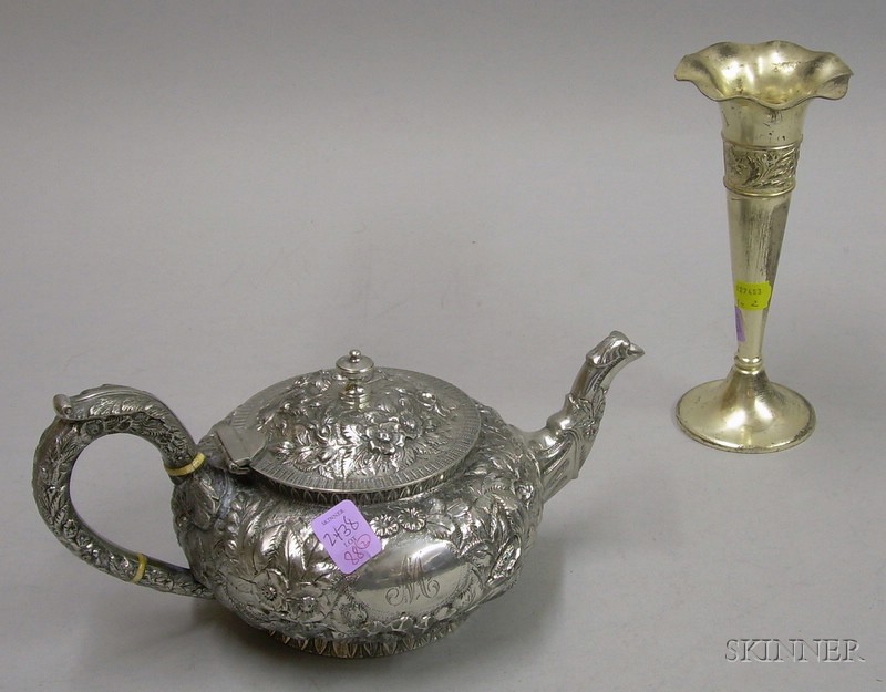 Appraisal: Justis and Armiger Silver Plated Repousse Teapot sold with a